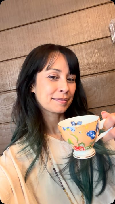 Flow Yoga Cedar Park member enjoying tea time at Serenity Cup in Austin Texas