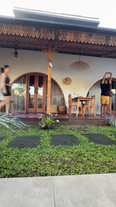 Flow Yoga Cedar Park instructor practicing yoga at Bali retreat accommodation Austin Texas