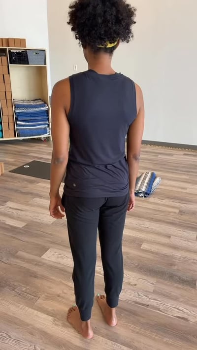 Flow Yoga Cedar Park instructor demonstrating stretch and relax class Austin Texas