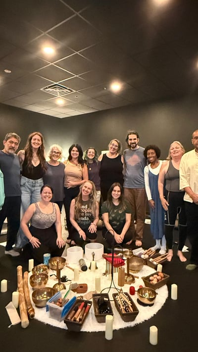 Flow Yoga Georgetown sound healing workshop group with singing bowls Austin Texas