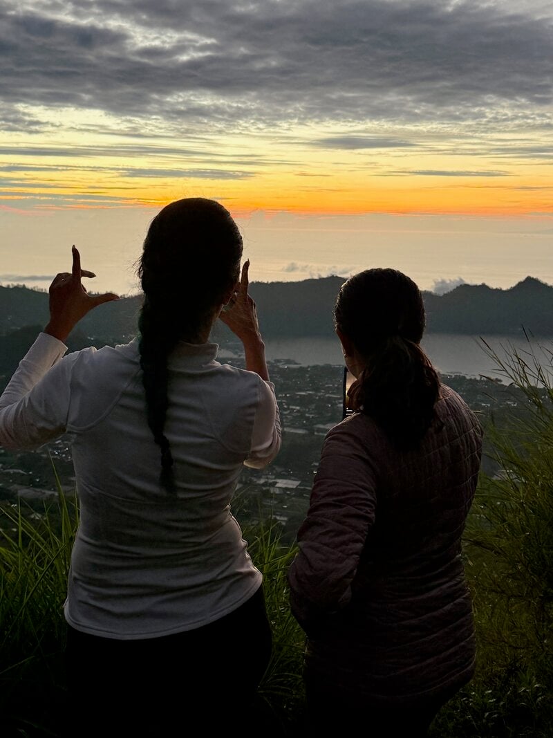 Bali Yoga Retreat Two Women Pointing At Sunrise
